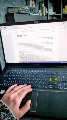 A laptop screen displaying a document,
